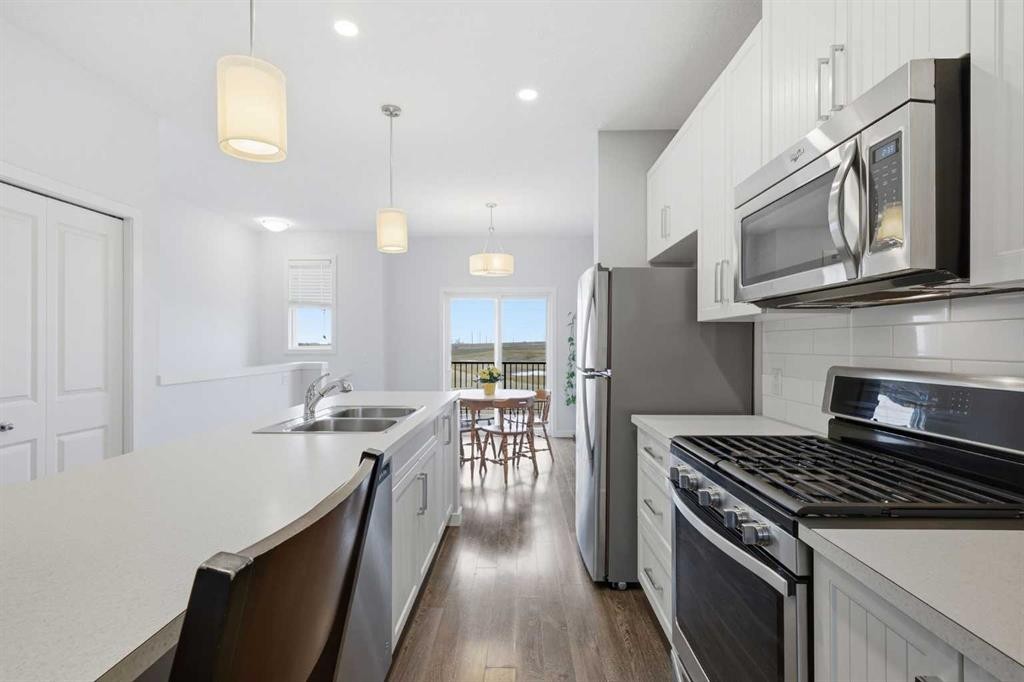 44 Copperstone Common Se, Calgary, AB - Indoor Photo Showing Kitchen With Stainless Steel Kitchen With Double Sink With Upgraded Kitchen