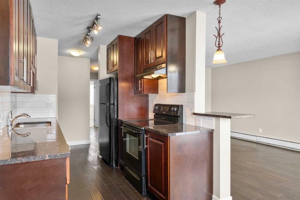 301-4455A Greenview Drive Ne, Calgary, AB - Indoor Photo Showing Kitchen