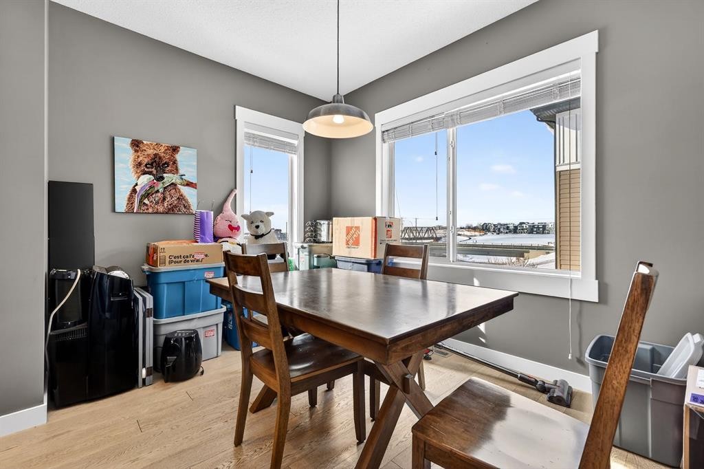 43-111 Rainbow Falls Gate, Chestermere, AB - Indoor Photo Showing Dining Room