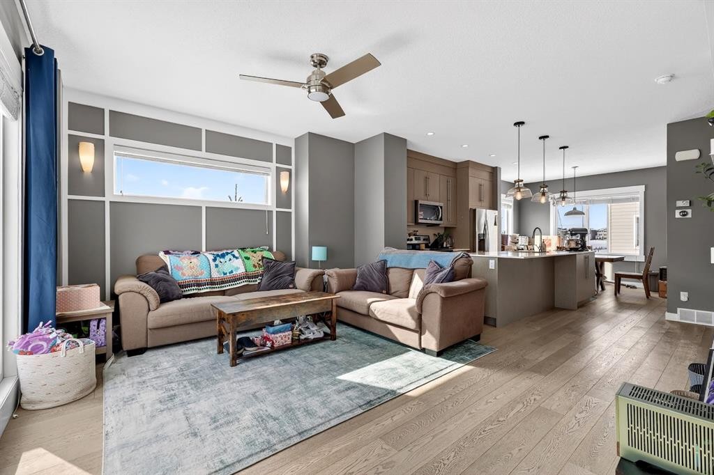 43-111 Rainbow Falls Gate, Chestermere, AB - Indoor Photo Showing Living Room