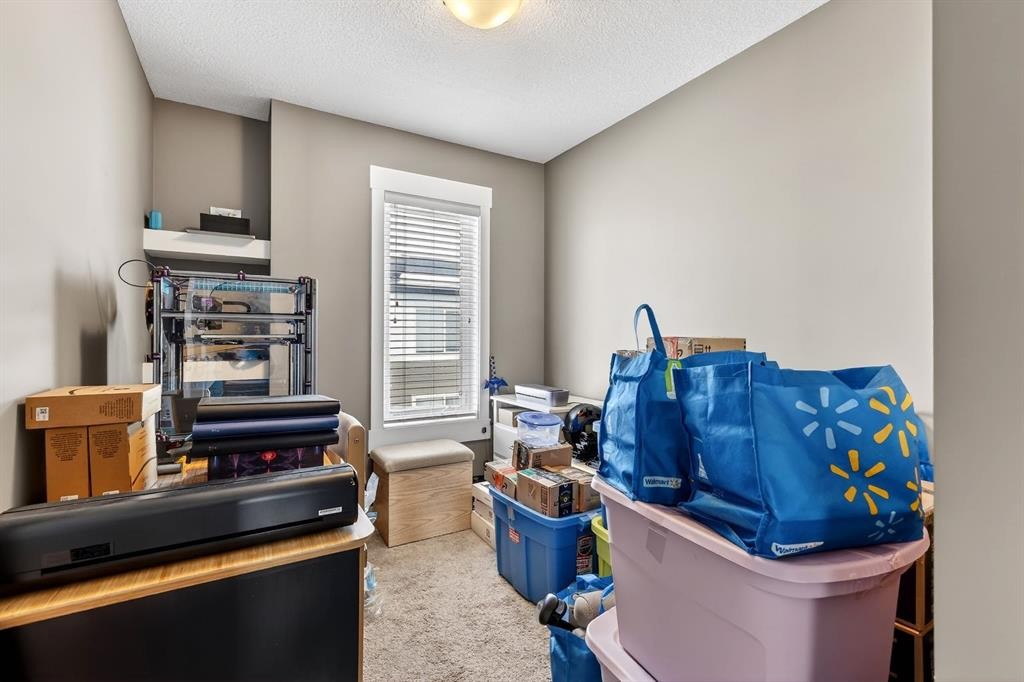 43-111 Rainbow Falls Gate, Chestermere, AB - Indoor Photo Showing Other Room