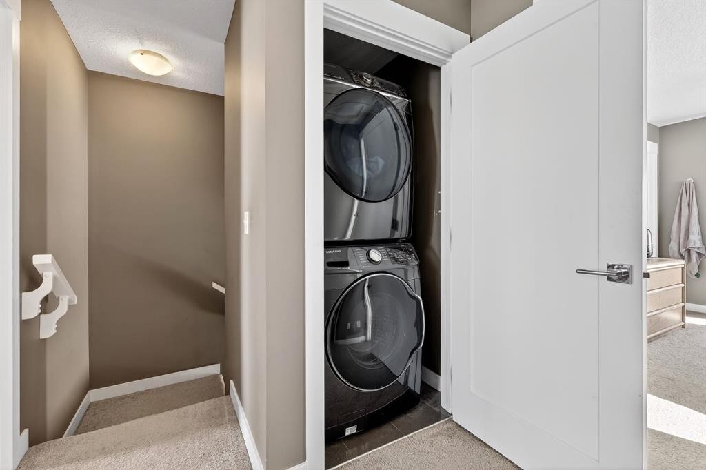 43-111 Rainbow Falls Gate, Chestermere, AB - Indoor Photo Showing Laundry Room