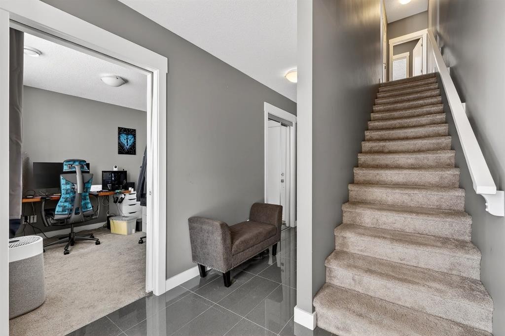 43-111 Rainbow Falls Gate, Chestermere, AB - Indoor Photo Showing Other Room