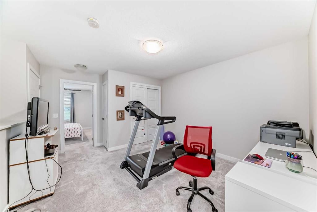342 Redstone Boulevard Ne, Calgary, AB - Indoor Photo Showing Gym Room