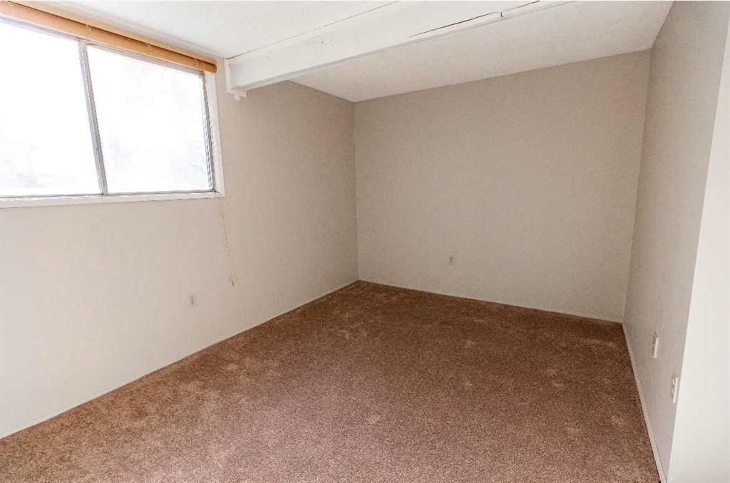92 Queen Isabella Close Se, Calgary, AB - Indoor Photo Showing Other Room