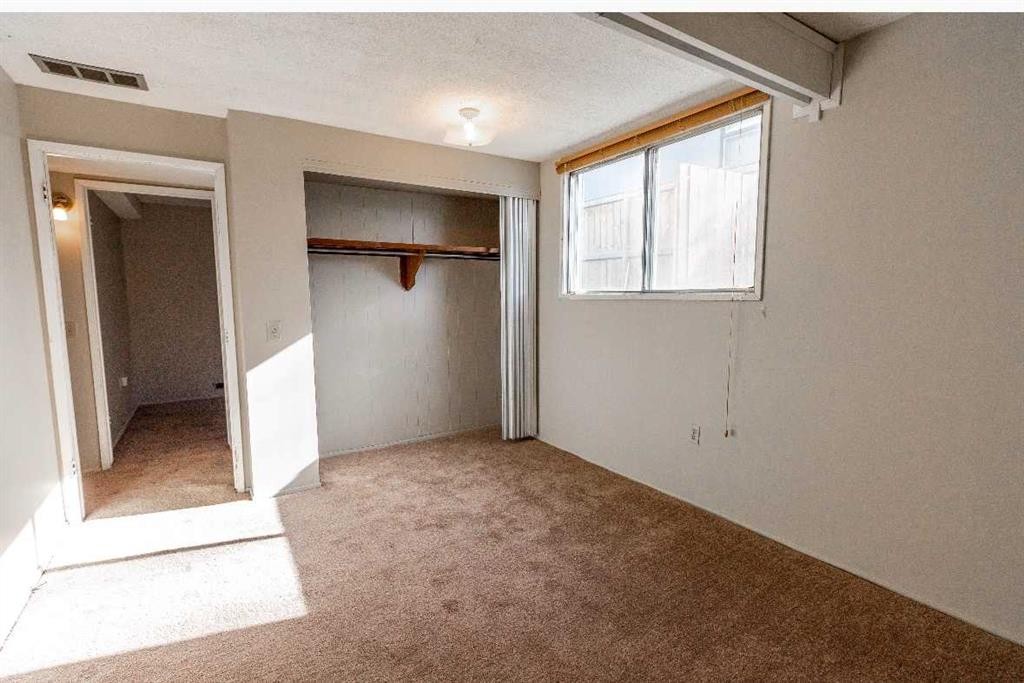 92 Queen Isabella Close Se, Calgary, AB - Indoor Photo Showing Other Room