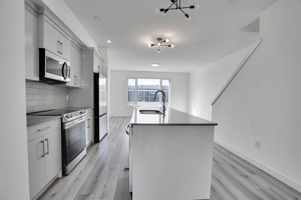 239 Saddlepeace Crescent Ne, Calgary, AB - Indoor Photo Showing Kitchen With Double Sink