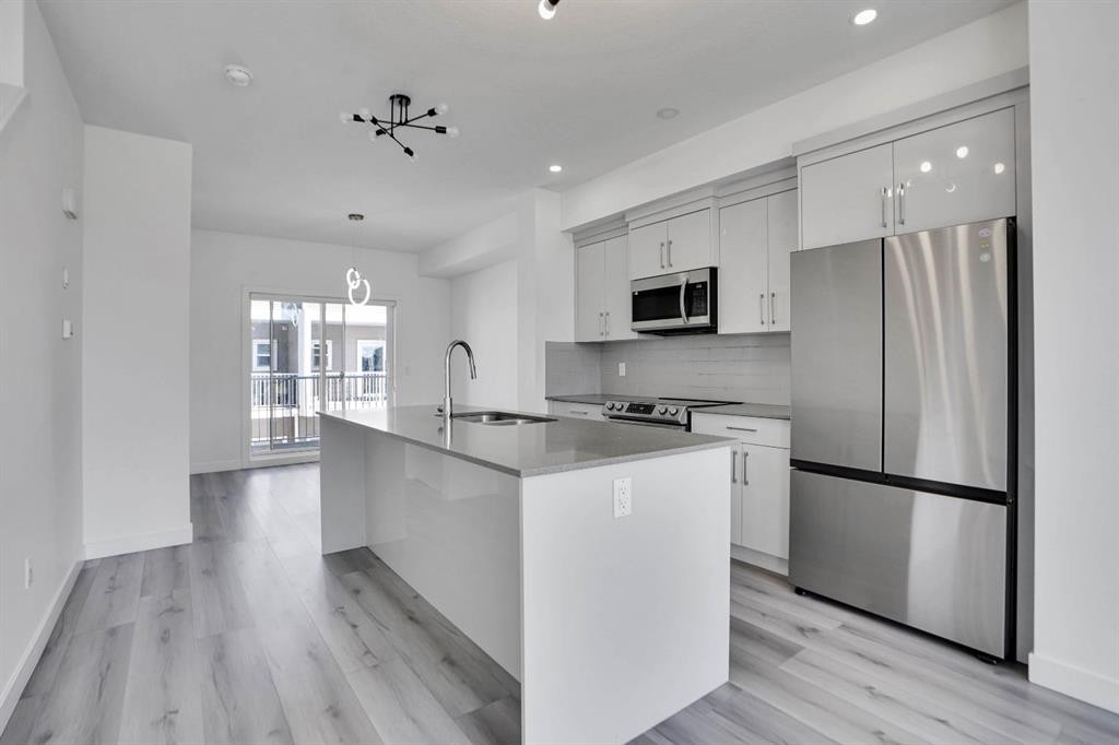 239 Saddlepeace Crescent Ne, Calgary, AB - Indoor Photo Showing Kitchen With Stainless Steel Kitchen With Upgraded Kitchen