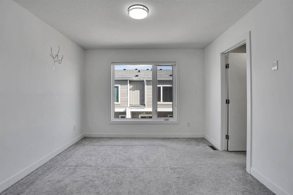 239 Saddlepeace Crescent Ne, Calgary, AB - Indoor Photo Showing Other Room