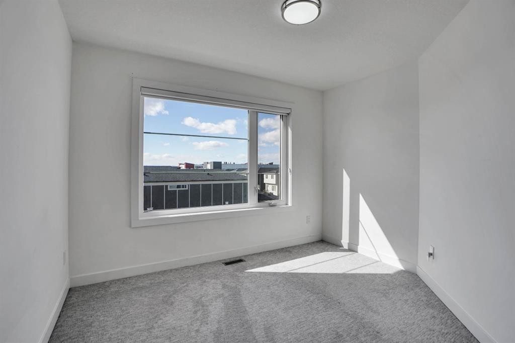 239 Saddlepeace Crescent Ne, Calgary, AB - Indoor Photo Showing Other Room