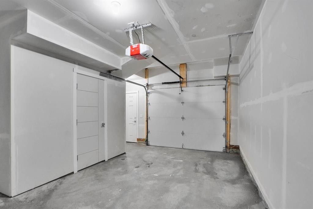 239 Saddlepeace Crescent Ne, Calgary, AB - Indoor Photo Showing Garage