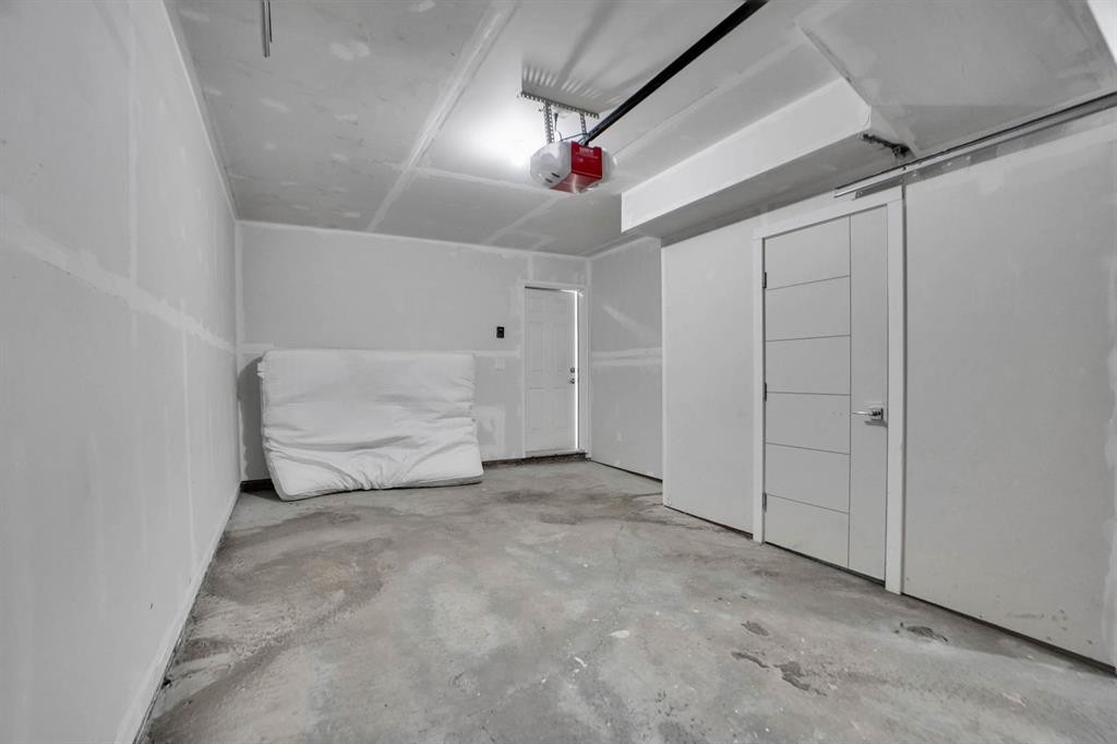 239 Saddlepeace Crescent Ne, Calgary, AB - Indoor Photo Showing Garage