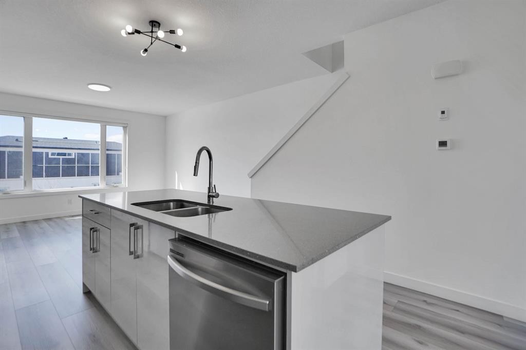 239 Saddlepeace Crescent Ne, Calgary, AB - Indoor Photo Showing Kitchen With Double Sink