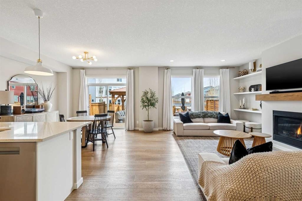 44 Legacy Landing Se, Calgary, AB - Indoor Photo Showing Living Room With Fireplace