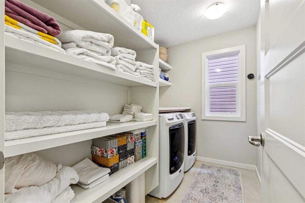 44 Legacy Landing Se, Calgary, AB - Indoor Photo Showing Laundry Room