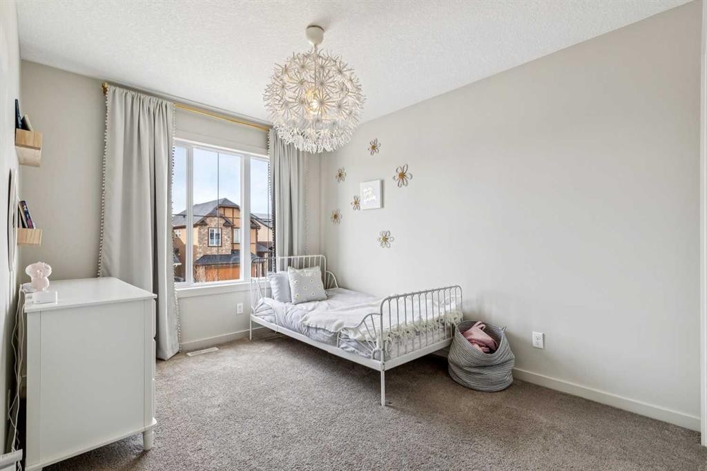 44 Legacy Landing Se, Calgary, AB - Indoor Photo Showing Bedroom