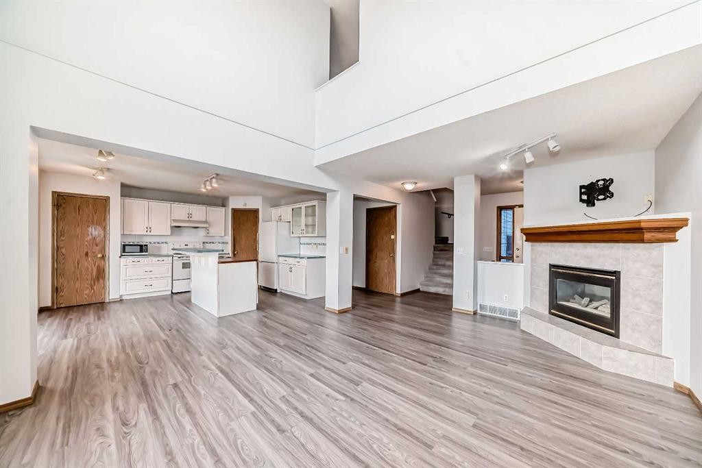 172 Panorama Hills Place Nw, Calgary, AB - Indoor With Fireplace