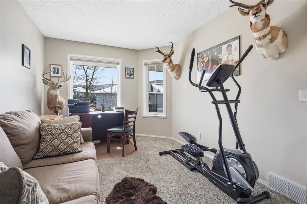 216 Valley Ridge Heights Nw, Calgary, AB - Indoor Photo Showing Gym Room