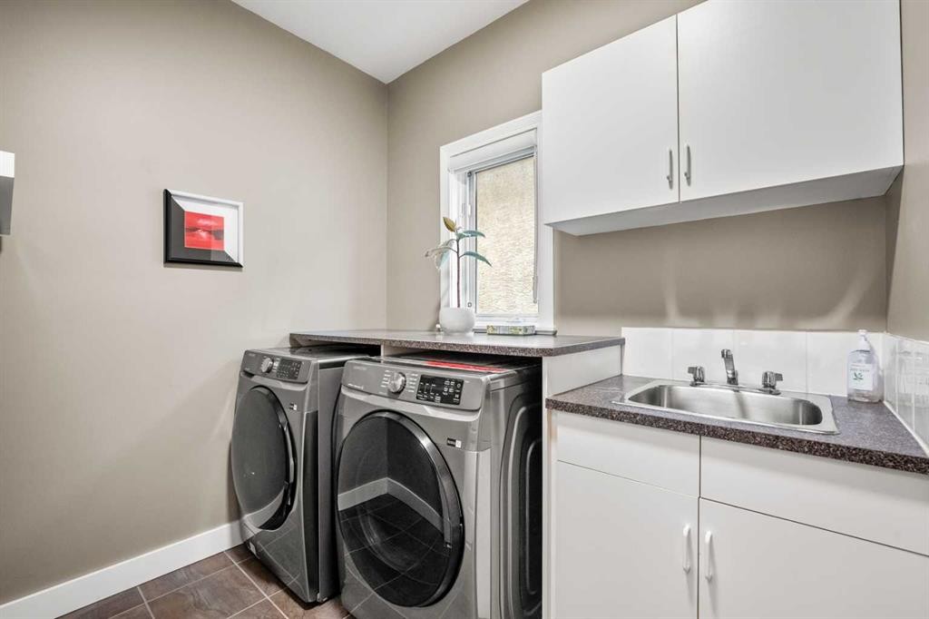 136 Patrick View Sw, Calgary, AB - Indoor Photo Showing Laundry Room