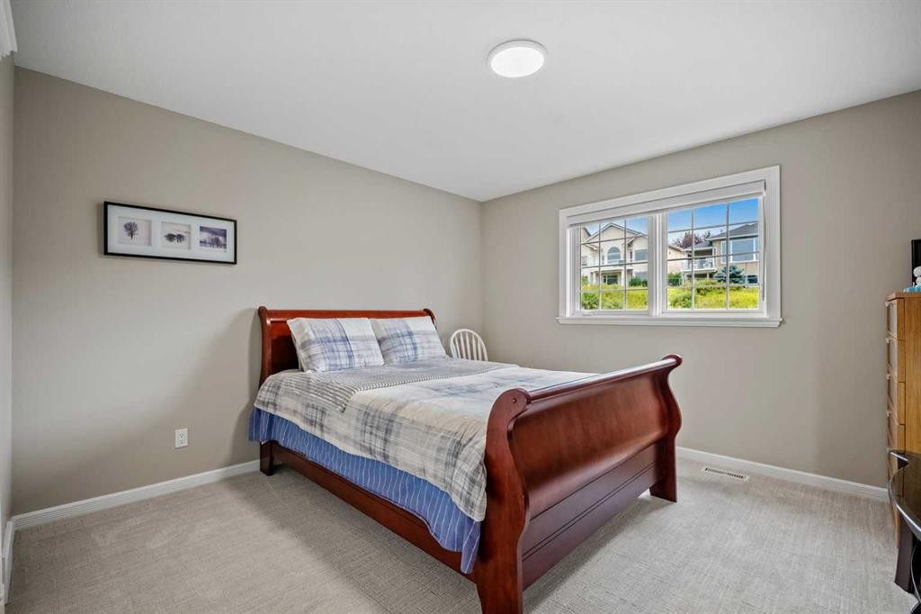 136 Patrick View Sw, Calgary, AB - Indoor Photo Showing Bedroom