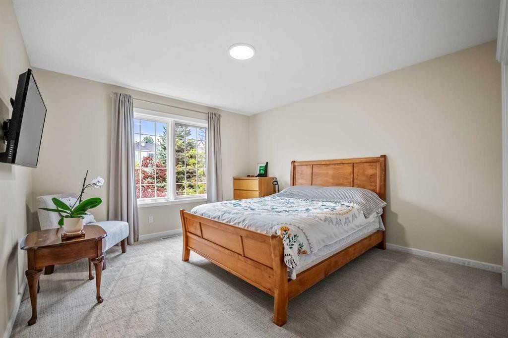 136 Patrick View Sw, Calgary, AB - Indoor Photo Showing Bedroom