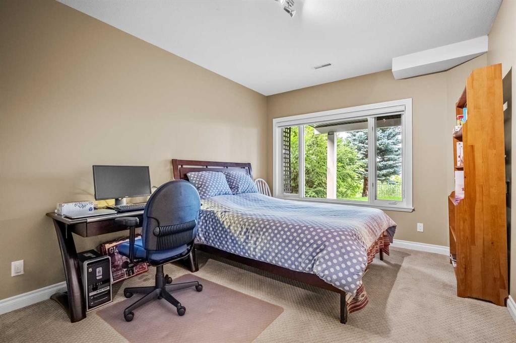 136 Patrick View Sw, Calgary, AB - Indoor Photo Showing Bedroom