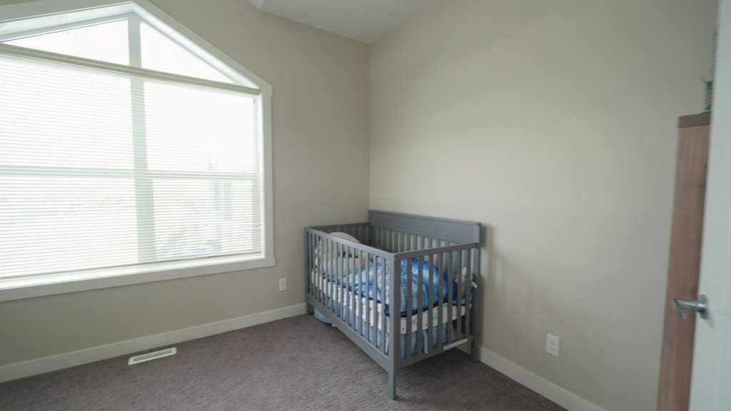 154 Redstone View Ne, Calgary, AB - Indoor Photo Showing Bedroom