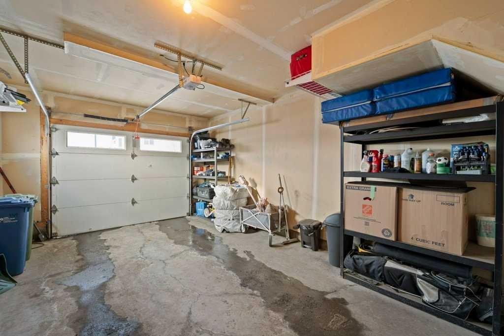 154 Redstone View Ne, Calgary, AB - Indoor Photo Showing Garage