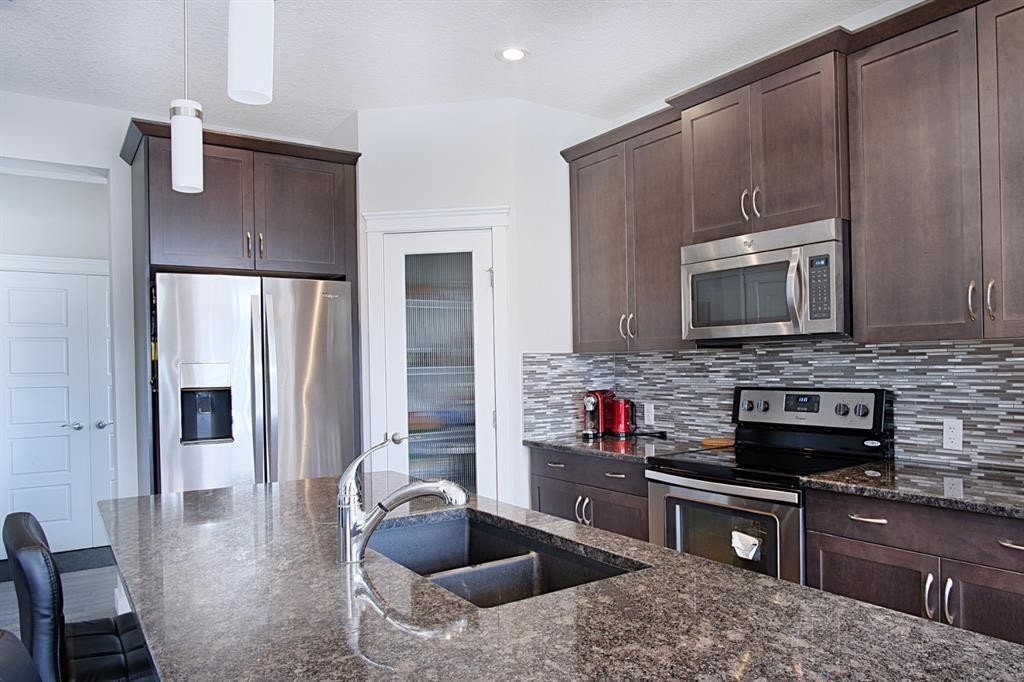 193 Redstone Common Ne, Calgary, AB - Indoor Photo Showing Kitchen With Stainless Steel Kitchen With Double Sink With Upgraded Kitchen