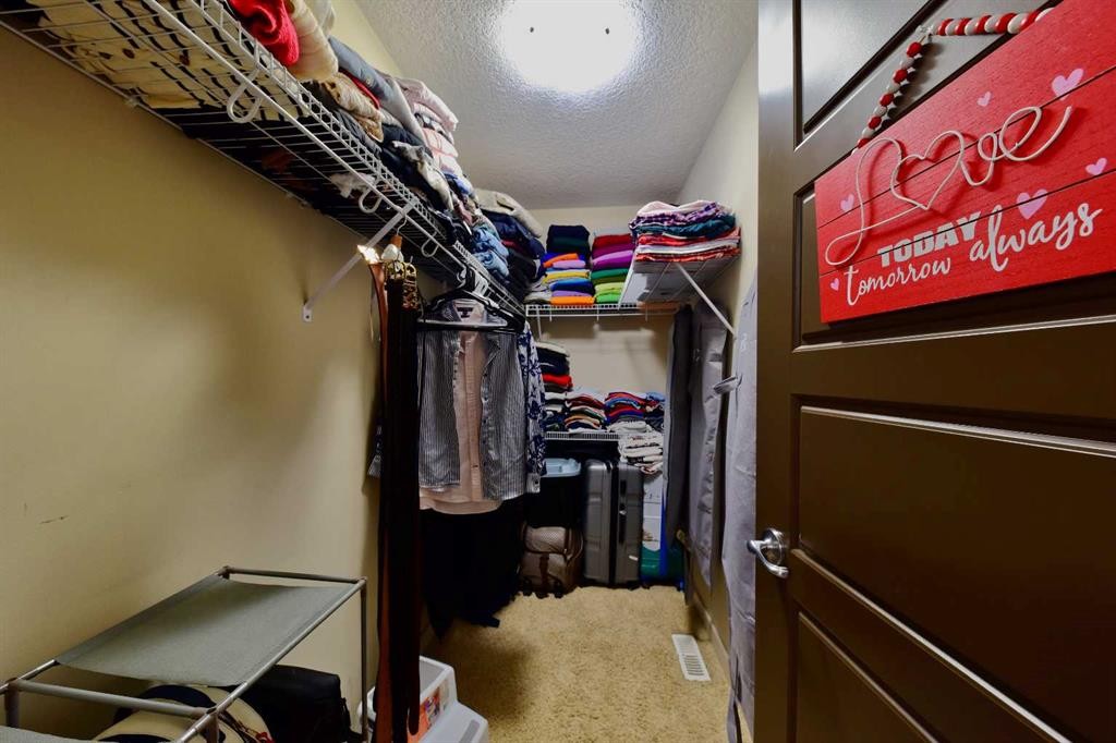 18 Redstone Manor Ne, Calgary, AB - Indoor With Storage