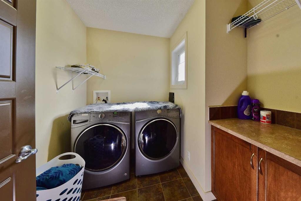 18 Redstone Manor Ne, Calgary, AB - Indoor Photo Showing Laundry Room