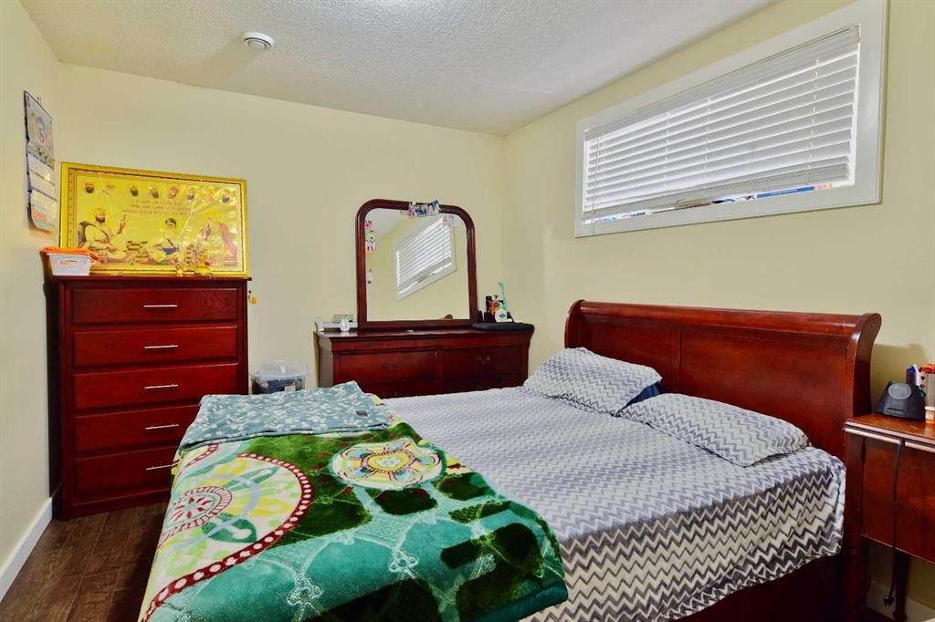 18 Redstone Manor Ne, Calgary, AB - Indoor Photo Showing Bedroom