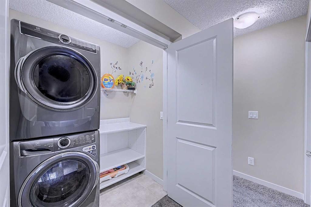 80 Chaparral Valley Crescent Se, Calgary, AB - Indoor Photo Showing Laundry Room