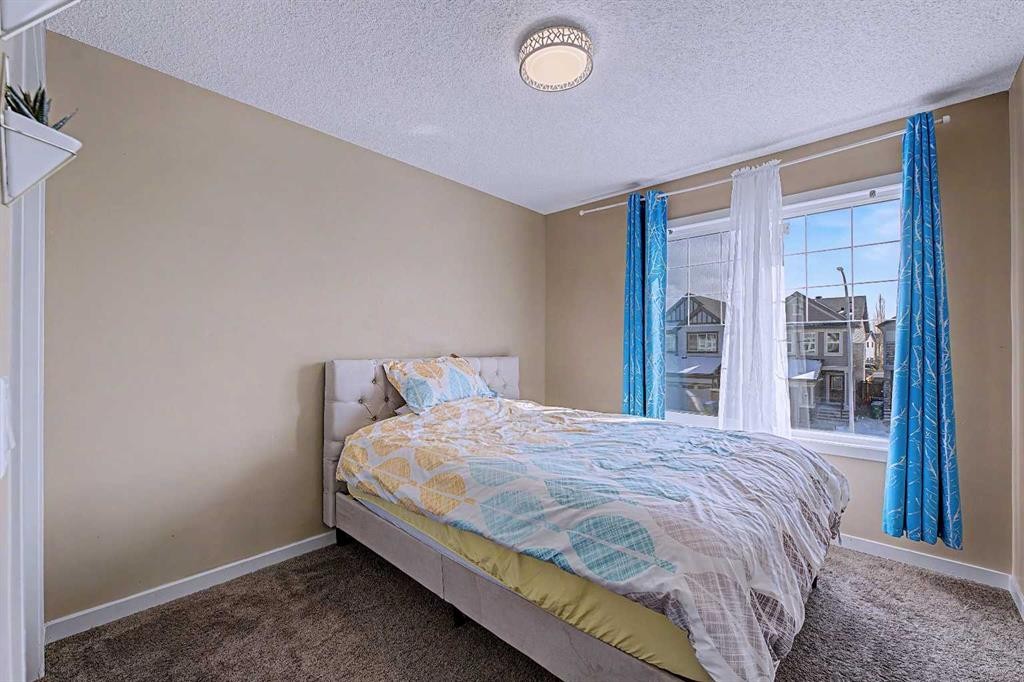 80 Chaparral Valley Crescent Se, Calgary, AB - Indoor Photo Showing Bedroom