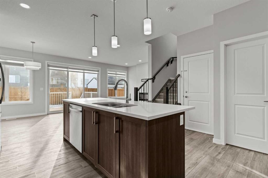 109 Mallard Grove Se, Calgary, AB - Indoor Photo Showing Kitchen With Double Sink