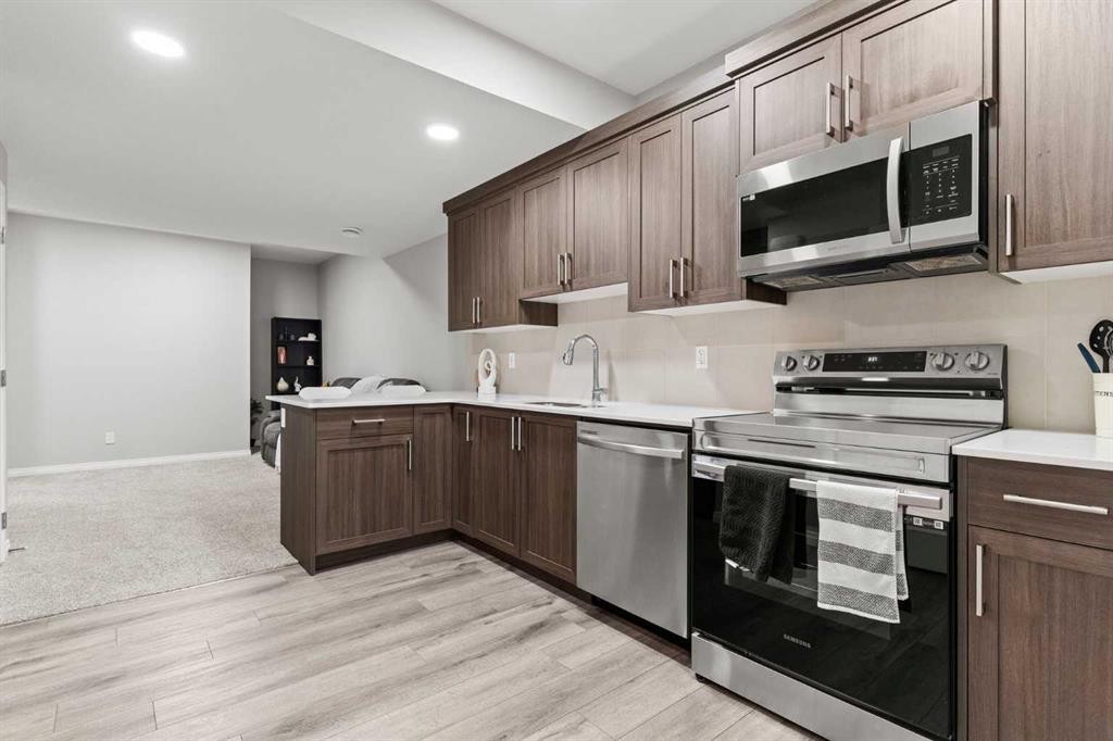 109 Mallard Grove Se, Calgary, AB - Indoor Photo Showing Kitchen With Stainless Steel Kitchen
