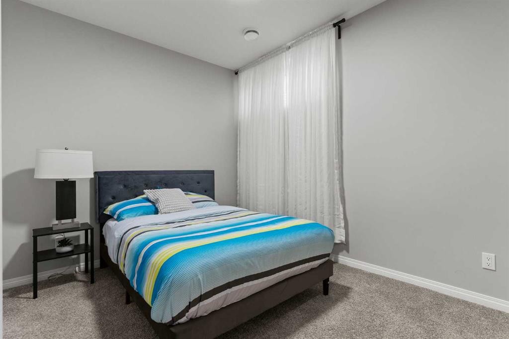 109 Mallard Grove Se, Calgary, AB - Indoor Photo Showing Bedroom