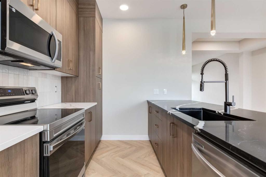 357 Cobblestone Gate, Airdrie, AB - Indoor Photo Showing Kitchen