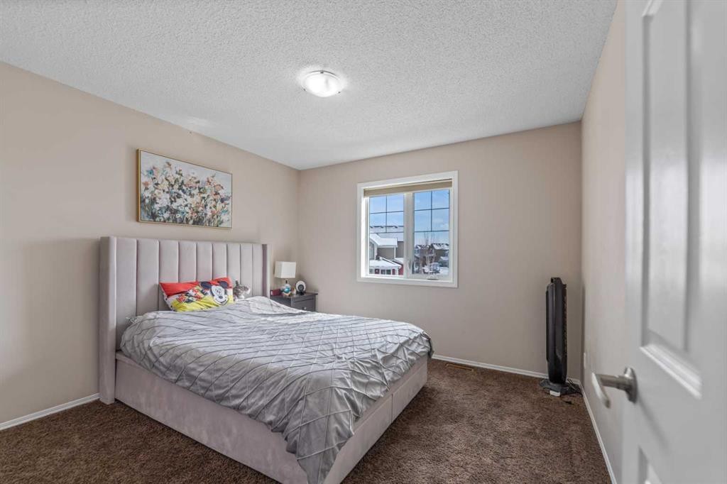 1148 Windhaven Close Sw, Airdrie, AB - Indoor Photo Showing Bedroom
