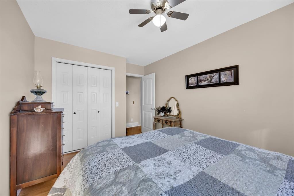 36 Alpine Crescent Se, Airdrie, AB - Indoor Photo Showing Bedroom