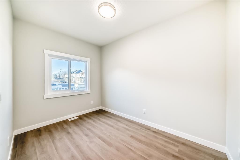 1102 Clover Close, Carstairs, AB - Indoor Photo Showing Other Room