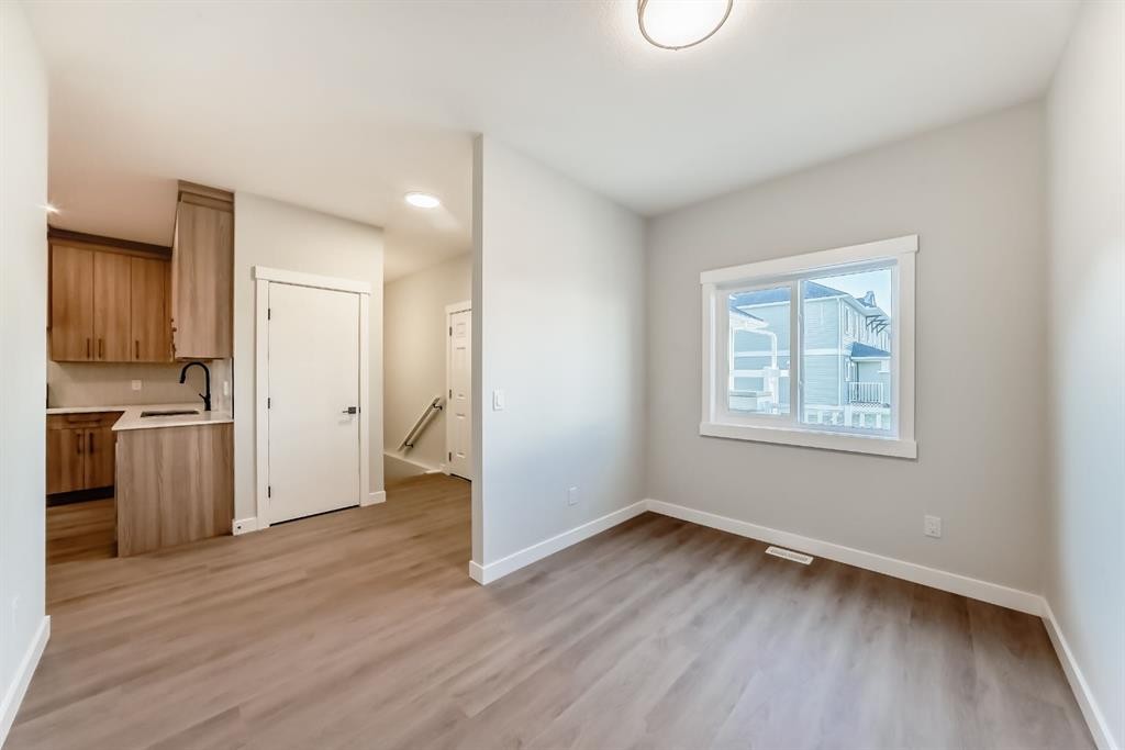 1102 Clover Close, Carstairs, AB - Indoor Photo Showing Other Room