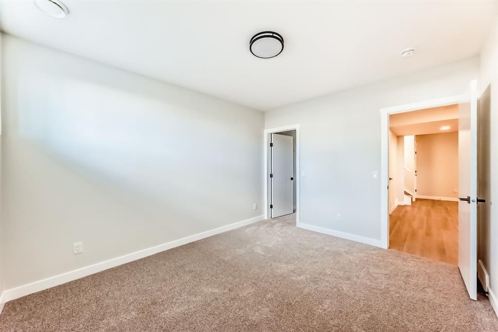 1102 Clover Close, Carstairs, AB - Indoor Photo Showing Other Room