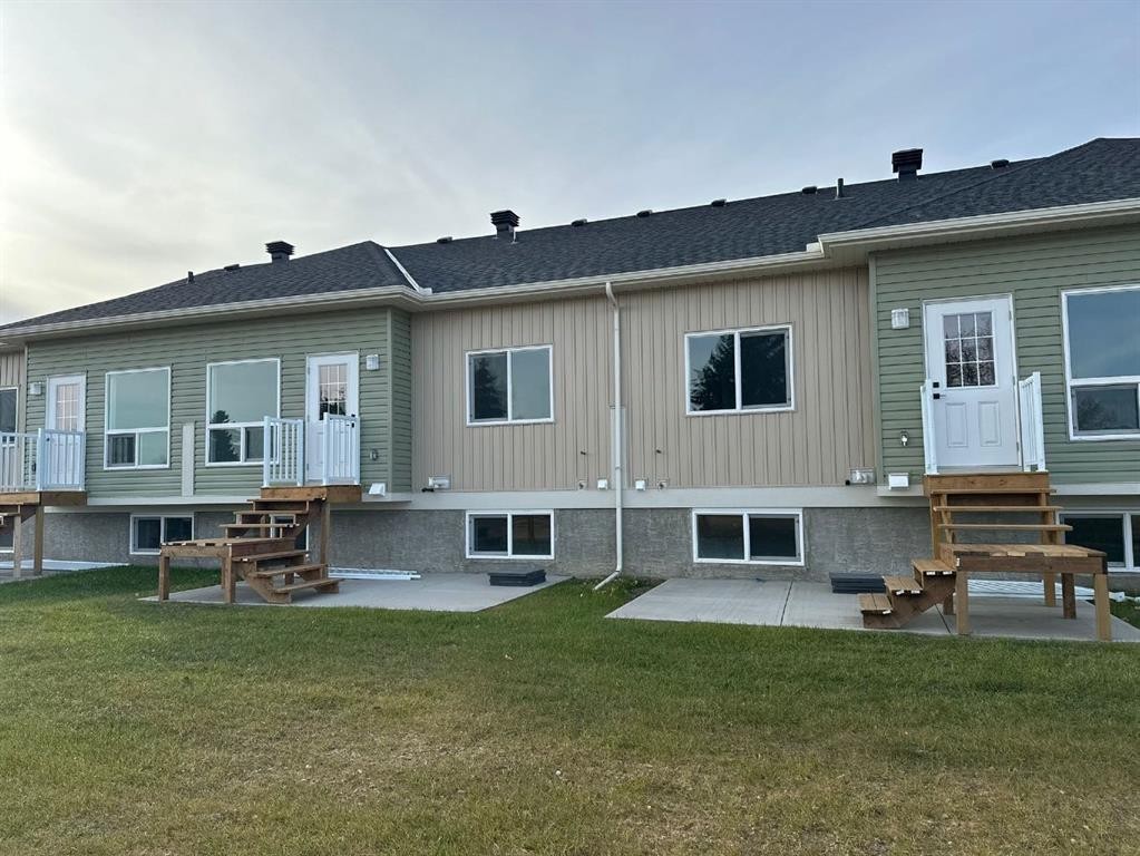 1102 Clover Close, Carstairs, AB - Outdoor With Deck Patio Veranda