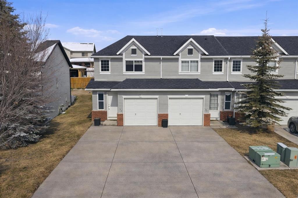 20 Covemeadow Manor Ne, Calgary, AB - Outdoor With Facade