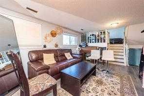 304 Whitefield Drive Ne, Calgary, AB - Indoor Photo Showing Living Room