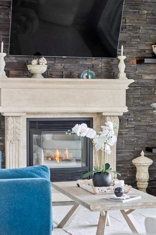 129 Mt Douglas Circle Se, Calgary, AB - Indoor Photo Showing Living Room With Fireplace