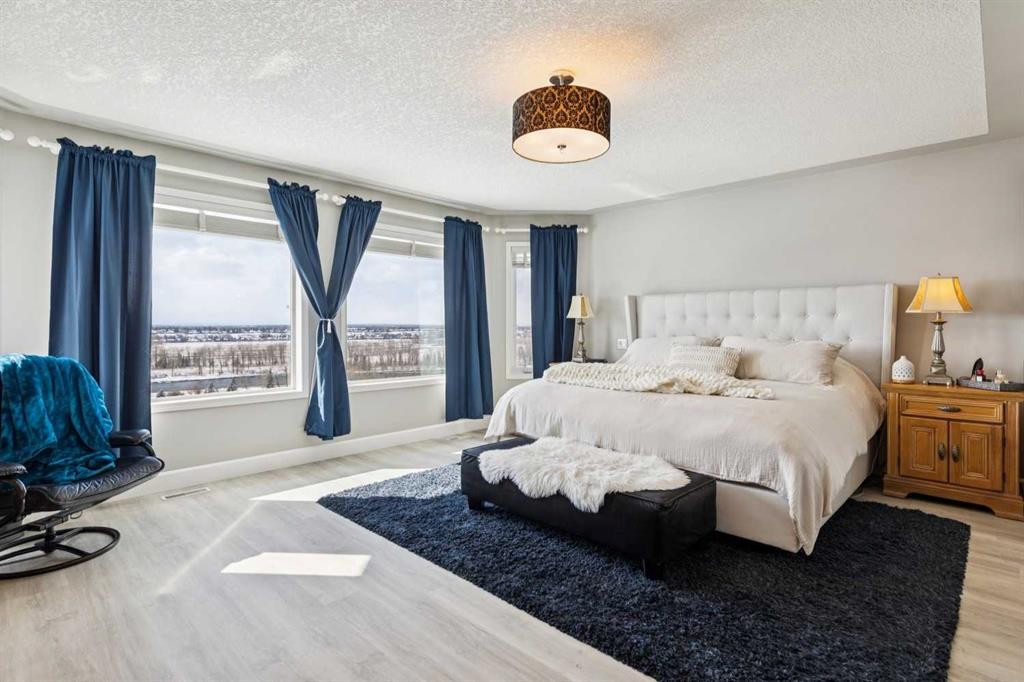 129 Mt Douglas Circle Se, Calgary, AB - Indoor Photo Showing Bedroom