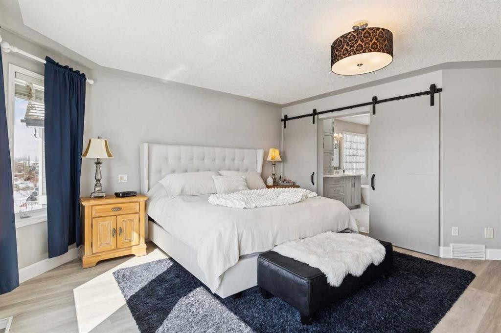 129 Mt Douglas Circle Se, Calgary, AB - Indoor Photo Showing Bedroom