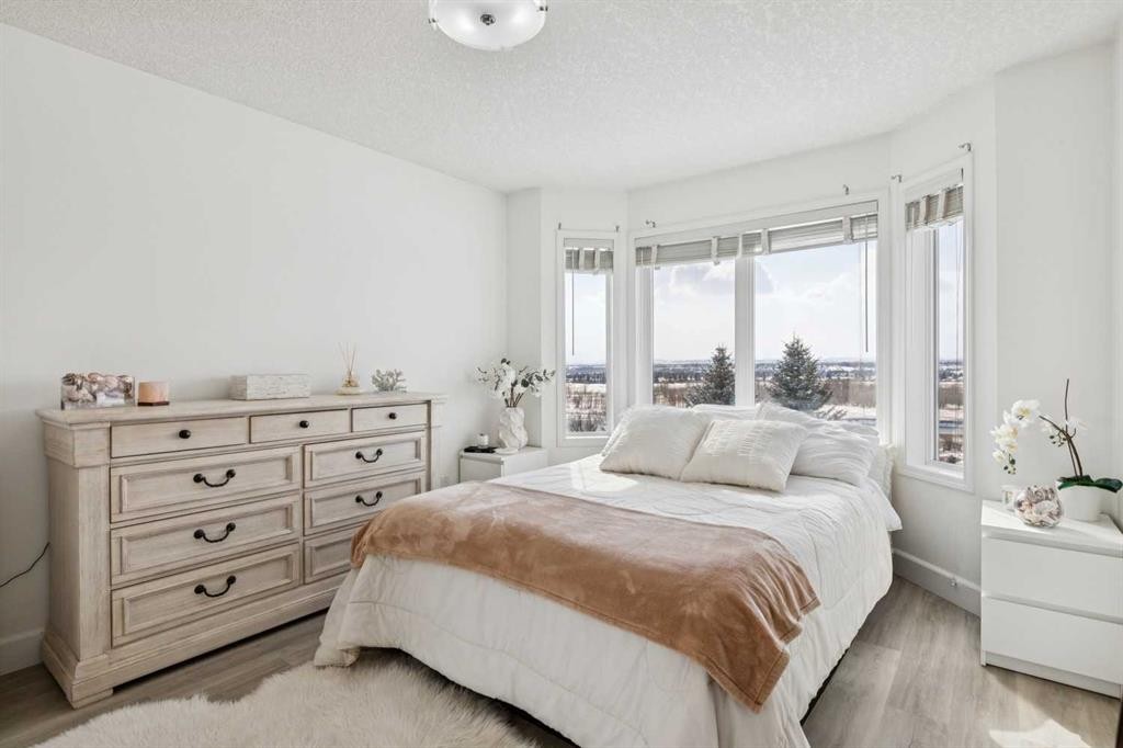 129 Mt Douglas Circle Se, Calgary, AB - Indoor Photo Showing Bedroom